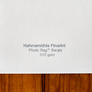 Close up of unprinted side of Hahnemuhle photorag baryta fine art paper showing paper details and paper texture